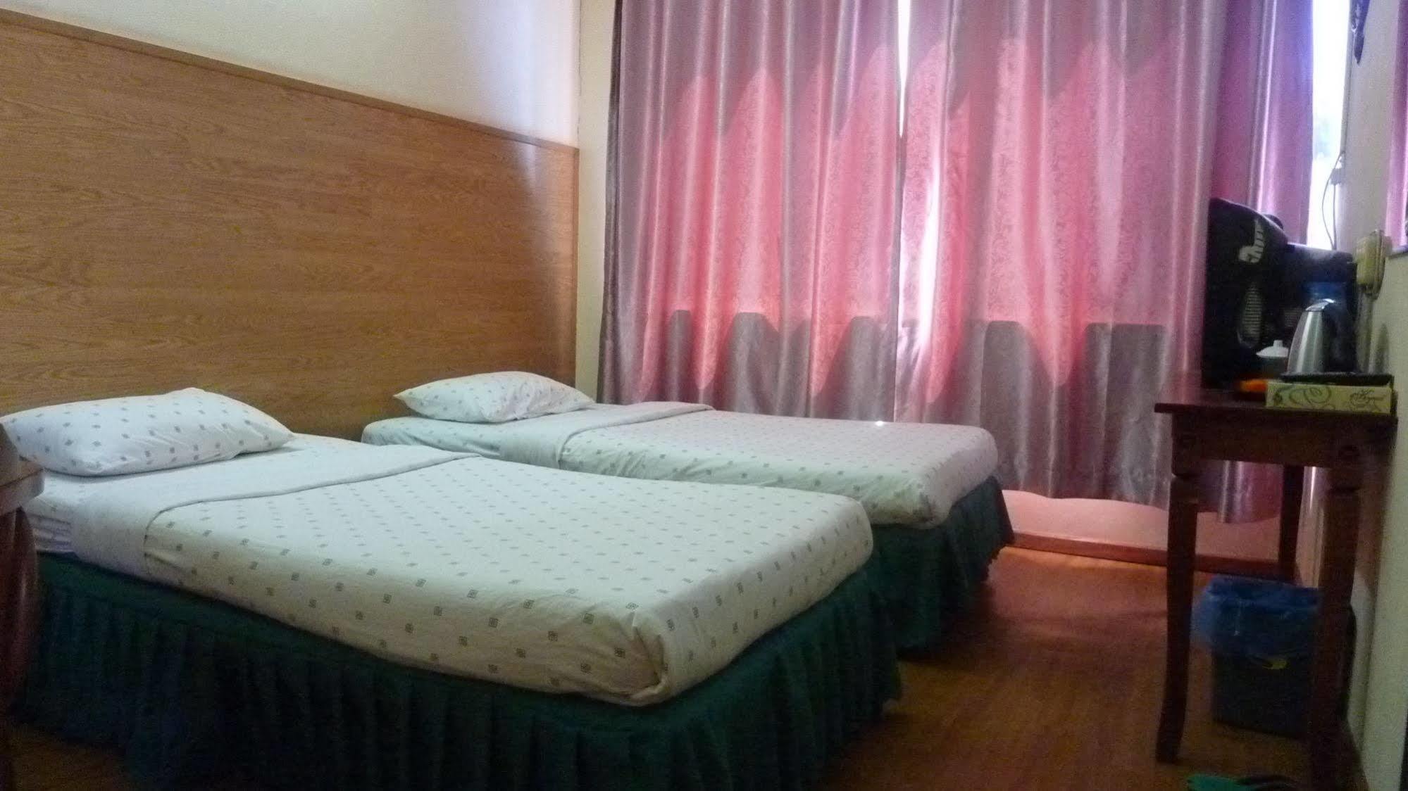 7 Hung Hung Inn Kota Kinabalu Extérieur photo